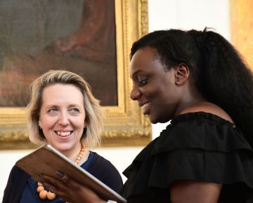 Cerys Purser (mezzo-soprano) and April Koyejo-Audiger (soprano) in rehearsal